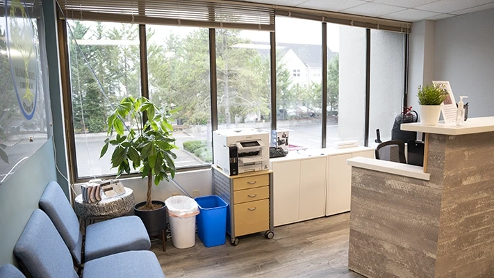 Chiropractic Redmond WA Behind Front Desk